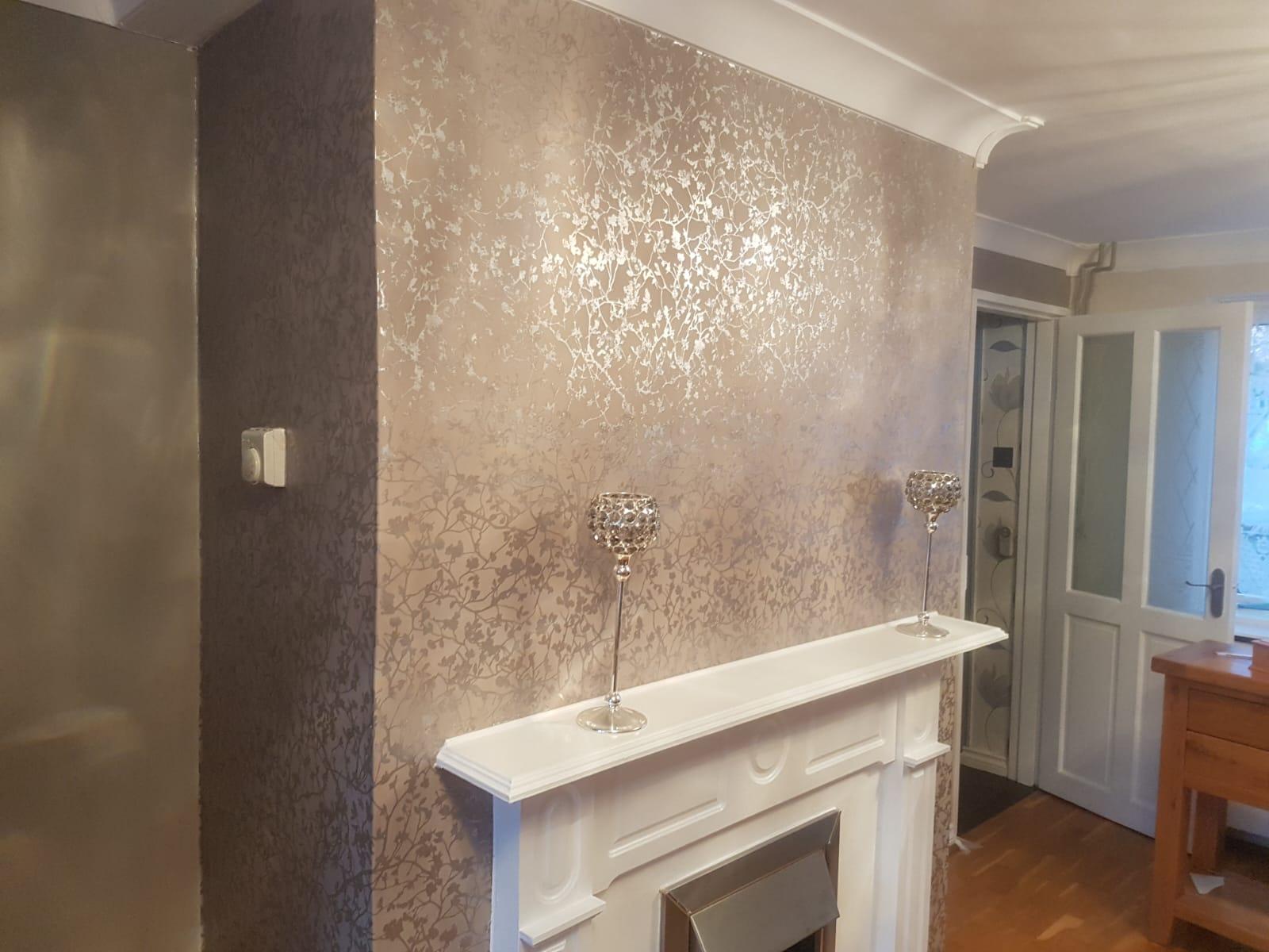 Metallic blossom wallpaper with white fireplace surround, Essex